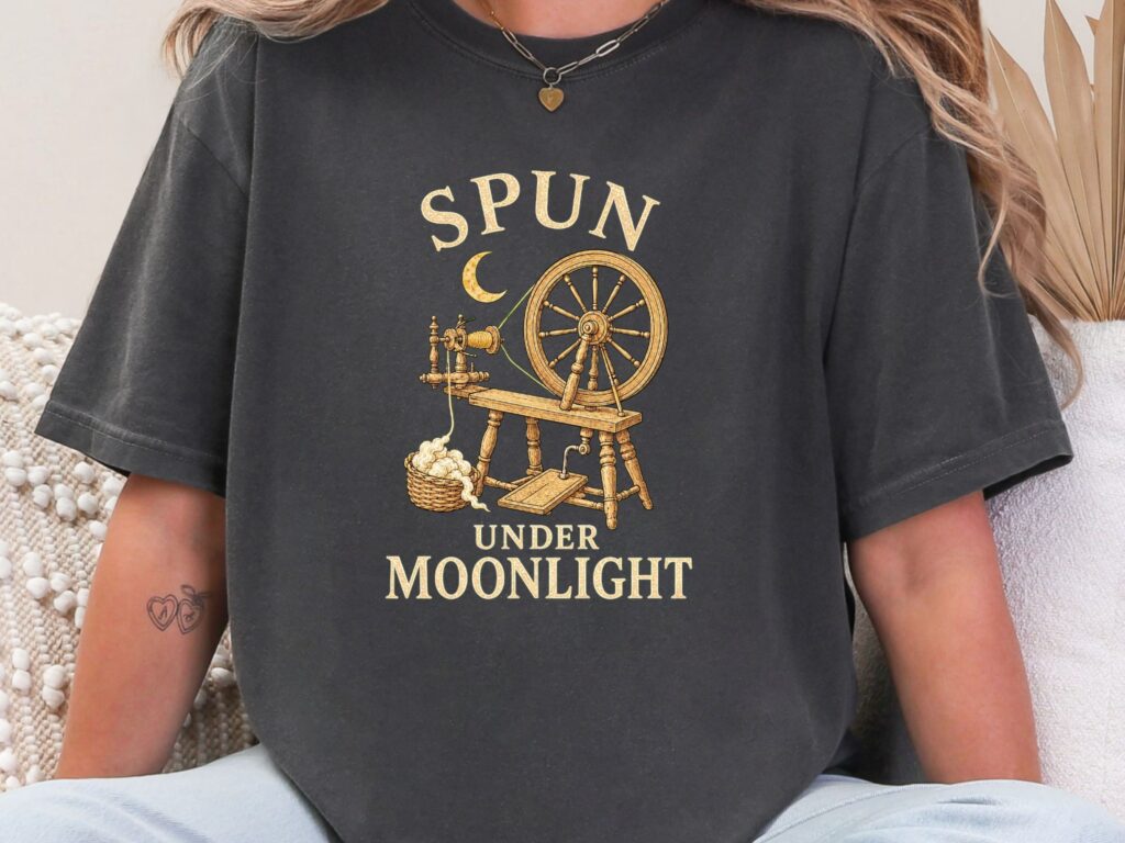 Softstead Spun Under Moonlight shirt with a vintage spinning wheel and crescent moon design